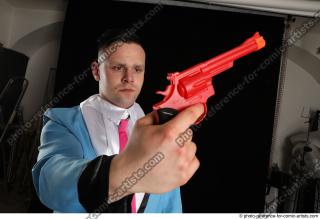 MIKAEL STANDING POSE WITH RED PISTOL